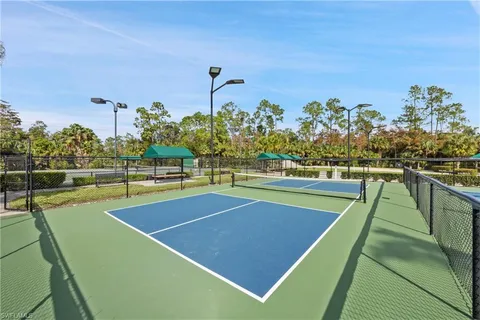 a view of a swimming pool with a lounge chairs