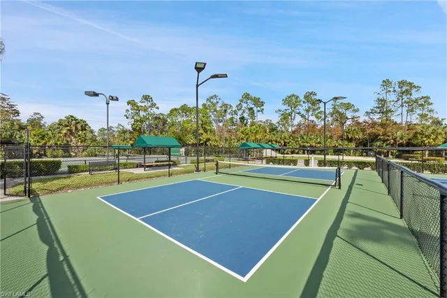 a view of a swimming pool with a lounge chairs