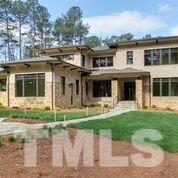 10605 Marion Stone Way Raleigh, NC 27614 - Photo 2 of 22 a front view of a house with a yard
