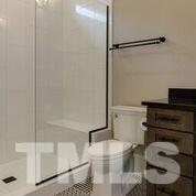 10605 Marion Stone Way Raleigh, NC 27614 - Photo 13 of 22 a bathroom with a toilet and a shower