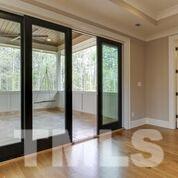 10605 Marion Stone Way Raleigh, NC 27614 - Photo 16 of 22 a view of a glass entrance door with glass window