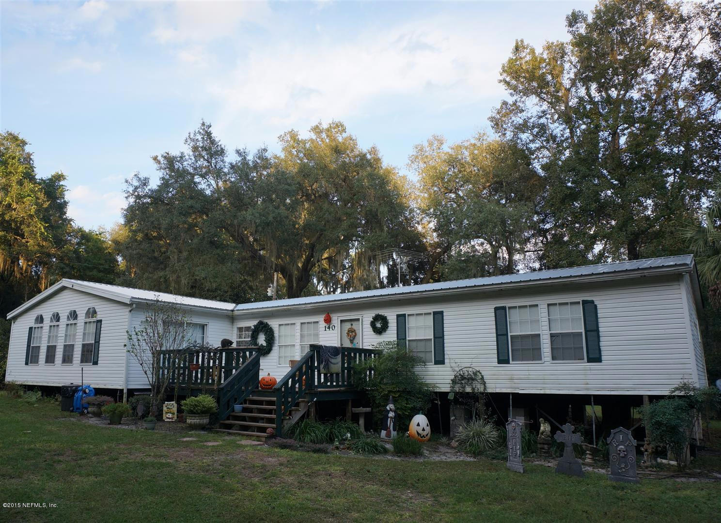 140 Deer Stand Road Florahome, FL 32140 - Photo 1 of 16 Spacious Triple Wide Mobile Home