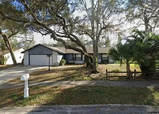 a house view with a outdoor space