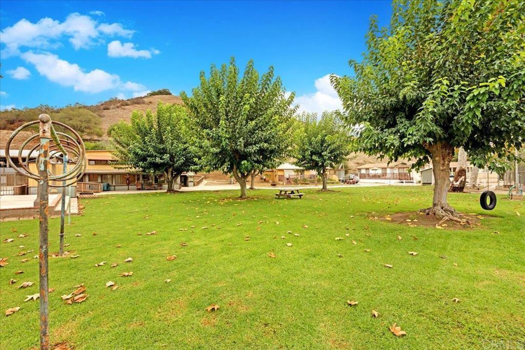 1631 Harbison Canyon Road, Unit 24 El Cajon, CA 92019 - Photo 12 of 33 a view of yard with swimming pool