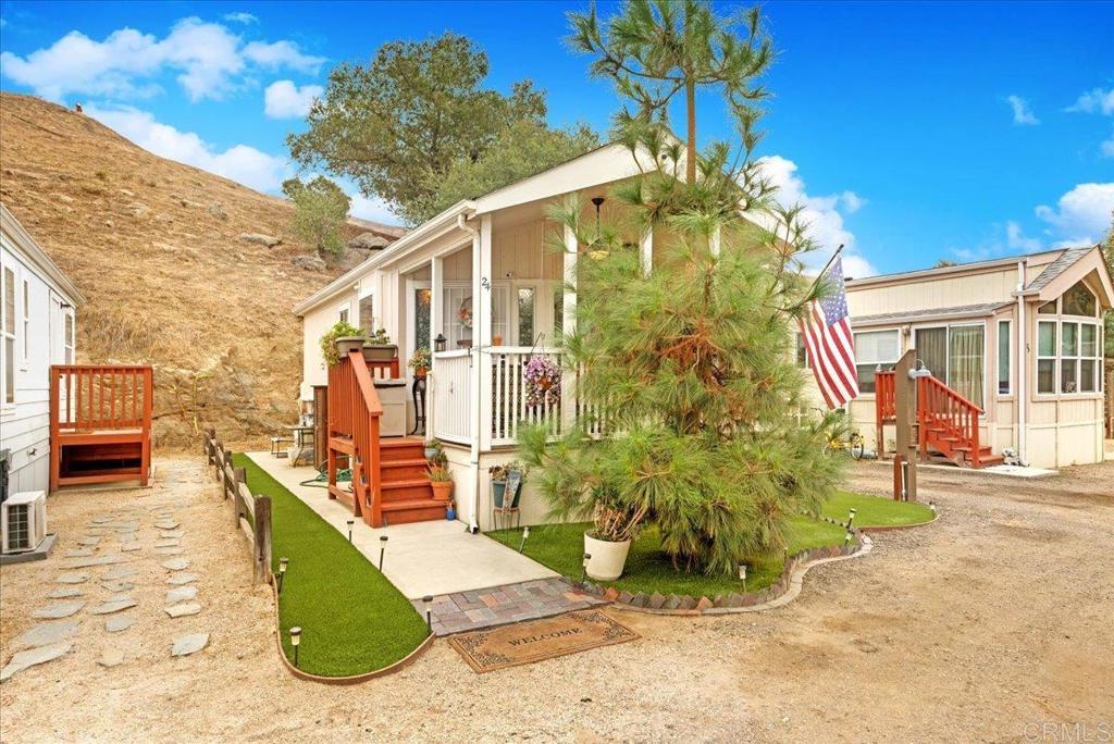 1631 Harbison Canyon Road, Unit 24 El Cajon, CA 92019 - Photo 16 of 33 a view of a house with a patio