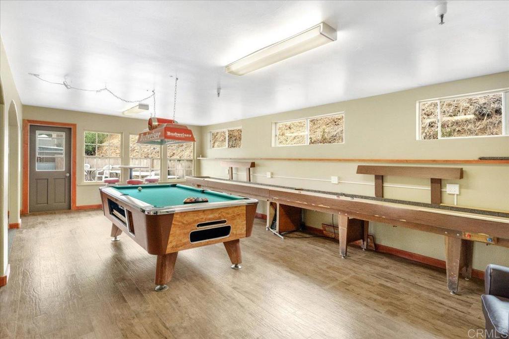 1631 Harbison Canyon Road, Unit 24 El Cajon, CA 92019 - Photo 18 of 33 a room with furniture pool table and windows