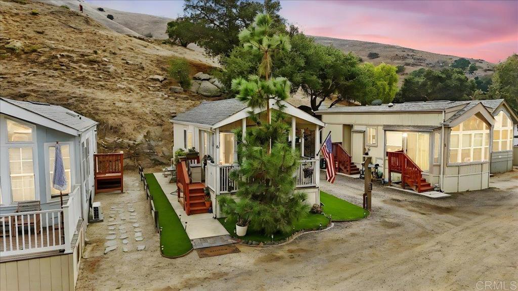 1631 Harbison Canyon Road, Unit 24 El Cajon, CA 92019 - Photo 20 of 33 a view of a house with a porch and furniture