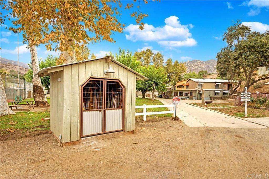 1631 Harbison Canyon Road, Unit 24 El Cajon, CA 92019 - Photo 25 of 33 a view of a house with a yard