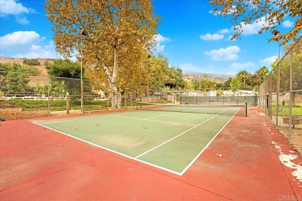 1631 Harbison Canyon Road, Unit 24 El Cajon, CA 92019 - Photo 27 of 33 a view of an outdoor space and tennis court