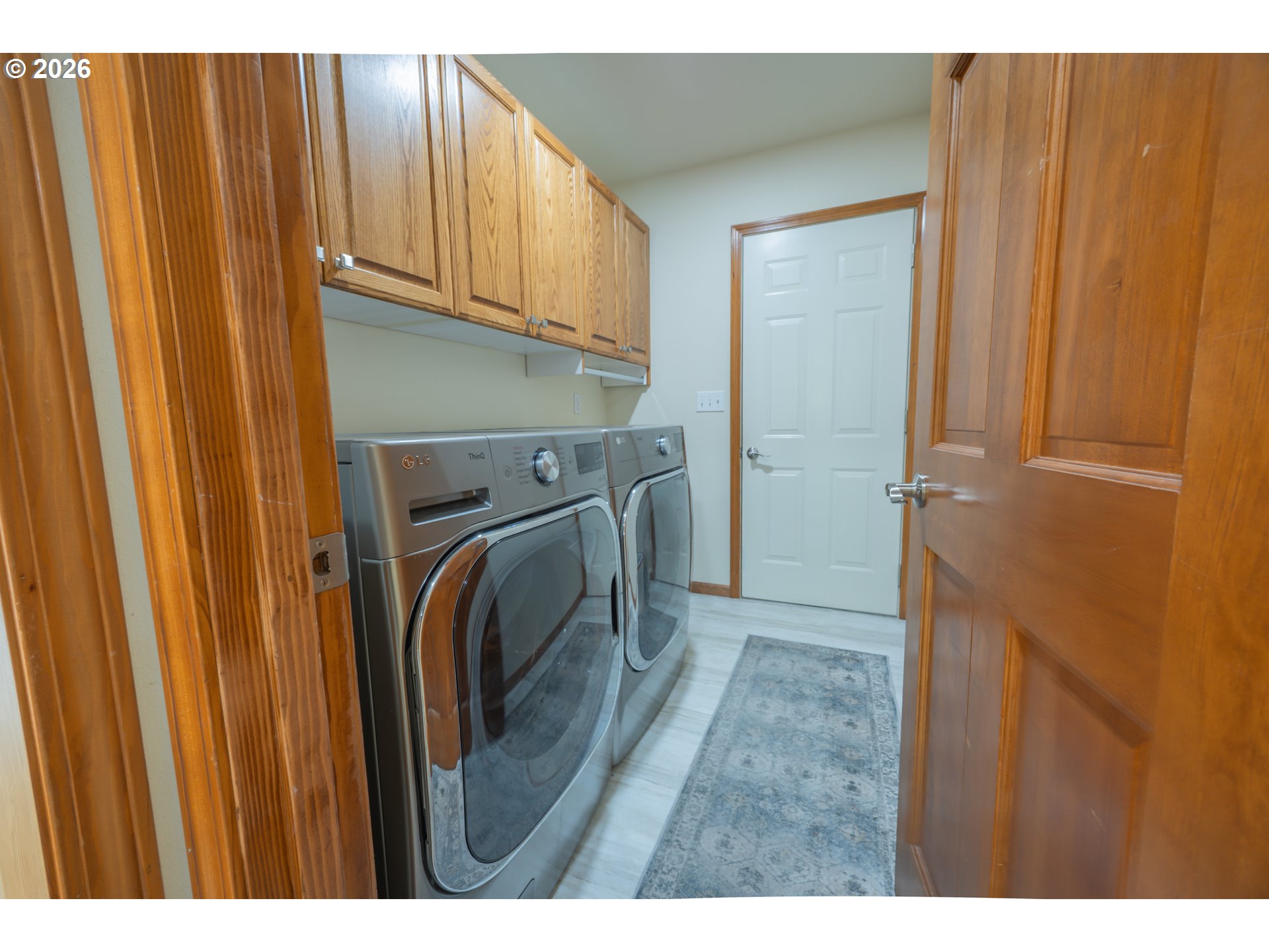 2193 13th Street Florence, OR 97439 - Photo 41 of 48 a view of a utility room with washer and dryer