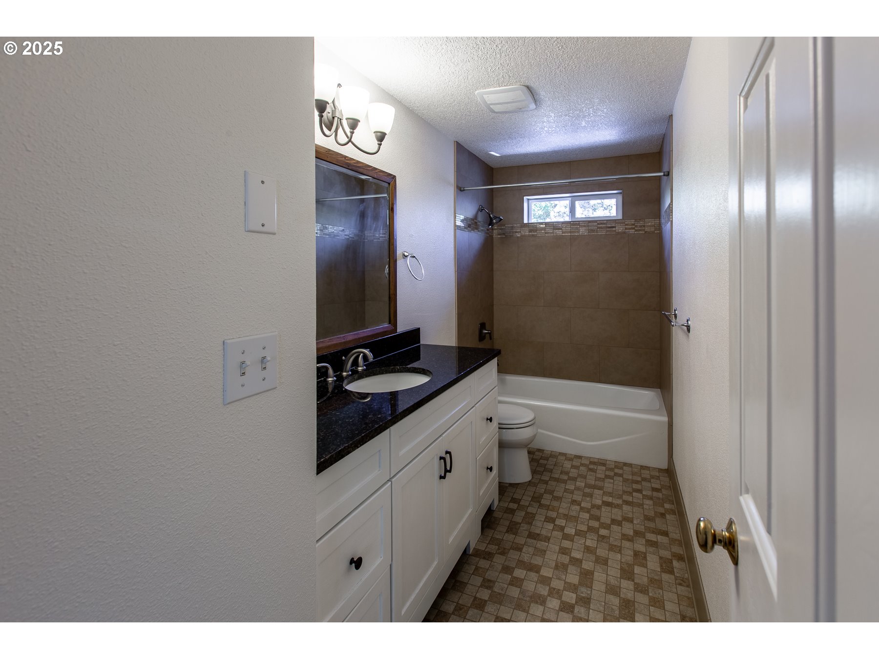 1403 Haven Street Eugene, OR 97402 - Photo 14 of 31 a bathroom with a sink a toilet and shower