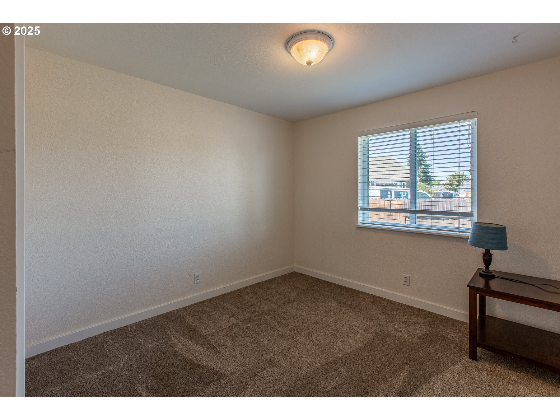 1403 Haven Street Eugene, OR 97402 - Photo 18 of 31 a view of an empty room with a window