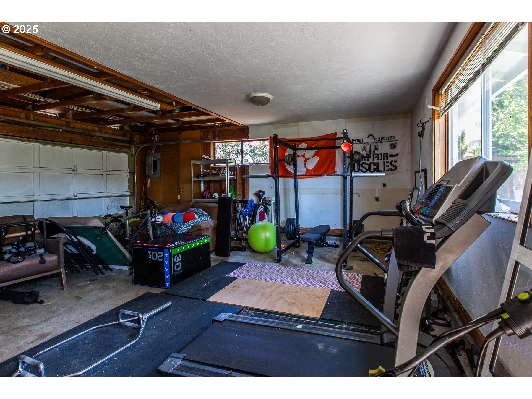 1403 Haven Street Eugene, OR 97402 - Photo 23 of 31 a living room with furniture and a flat screen tv