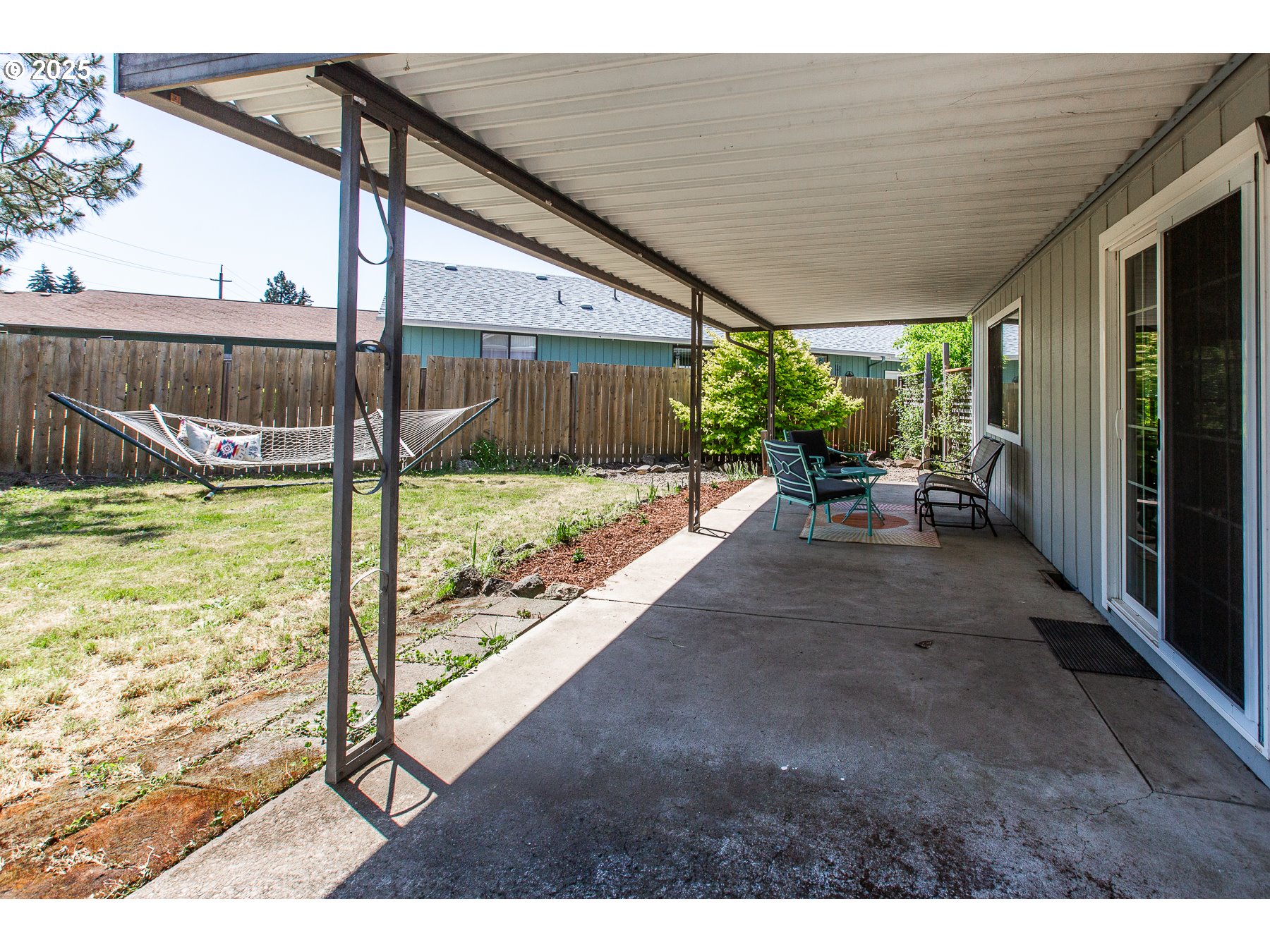 1403 Haven Street Eugene, OR 97402 - Photo 25 of 31 a view of a backyard with sitting area