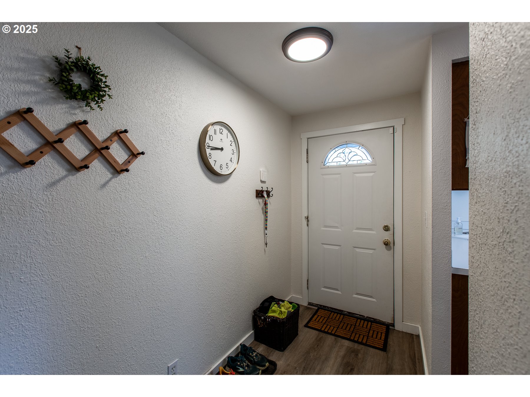 1403 Haven Street Eugene, OR 97402 - Photo 4 of 31 a view of a hallway with wooden floor