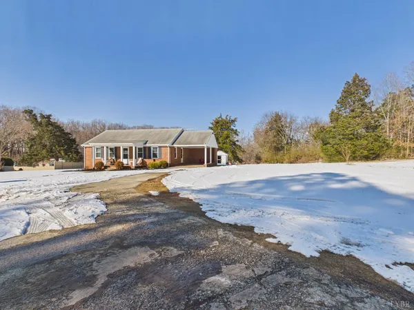 a view of a large space with a house