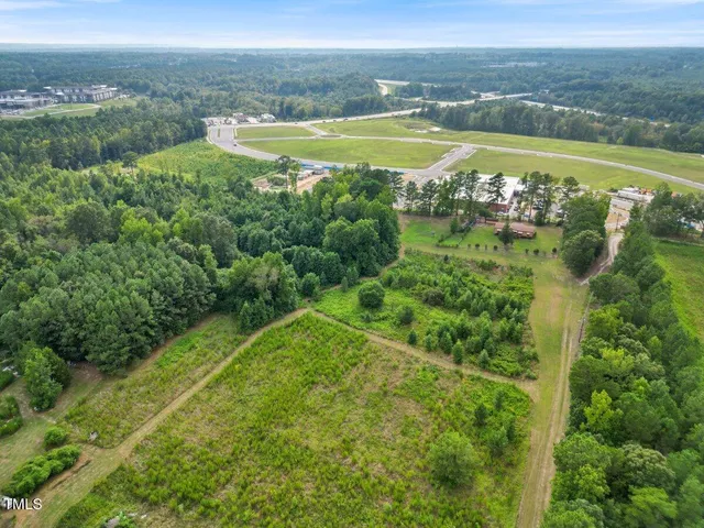 a view of a city with lawn chairs