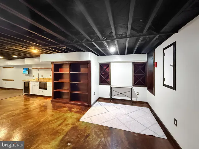 a room with furniture and a rug