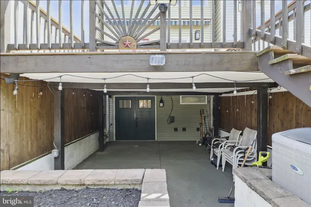 a view of a building with sitting area