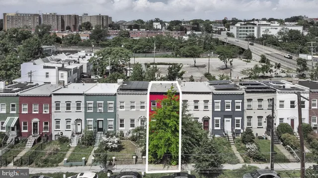 a view of city with tall buildings