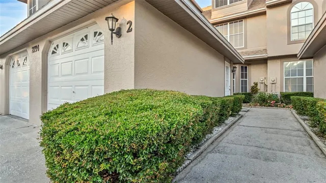 a view of a pathway along the building