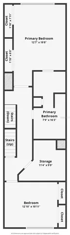 front view of a house with a tree