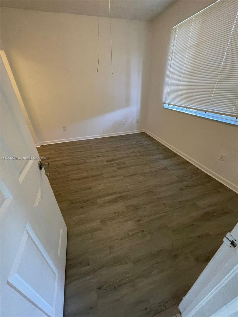 Riviera Beach Riviera Beach, FL 33404 - Photo 12 of 20 a view of small space with wooden floor