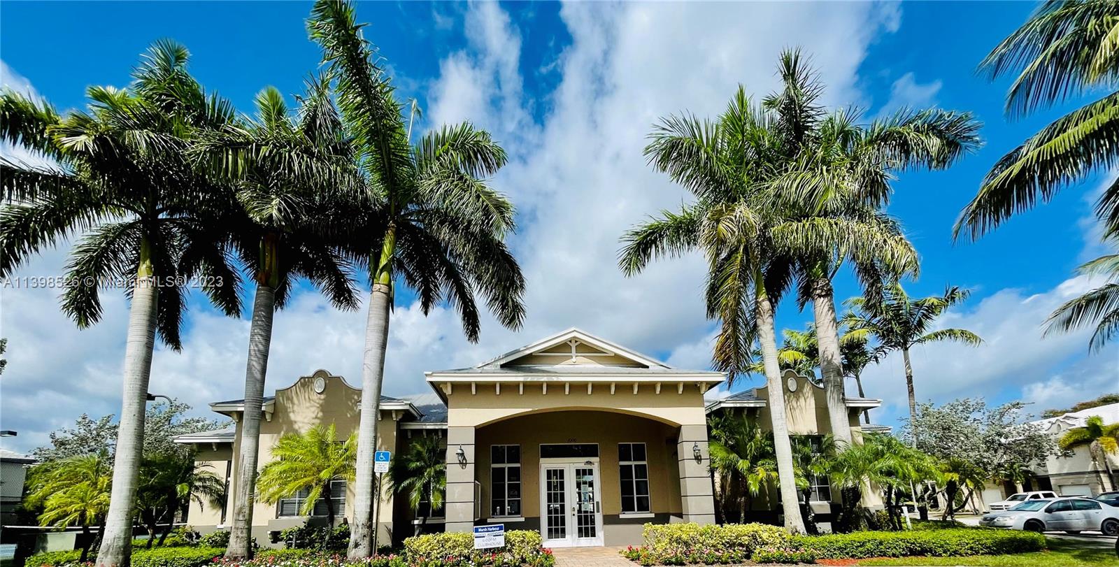 Riviera Beach Riviera Beach, FL 33404 - Photo 20 of 20 a front view of multi story residential apartment building with yard and green space