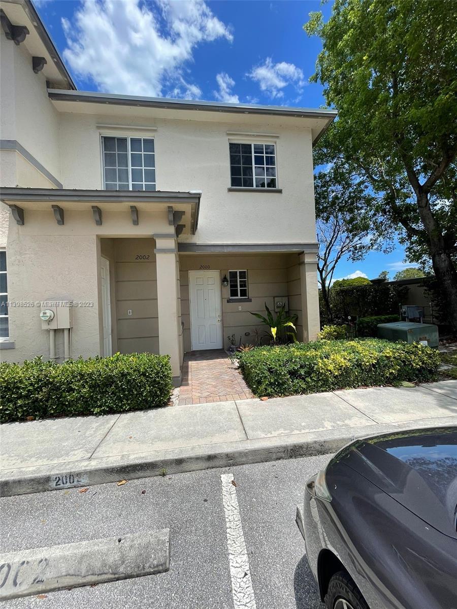 Riviera Beach Riviera Beach, FL 33404 - Photo 2 of 20 front view of house with a yard
