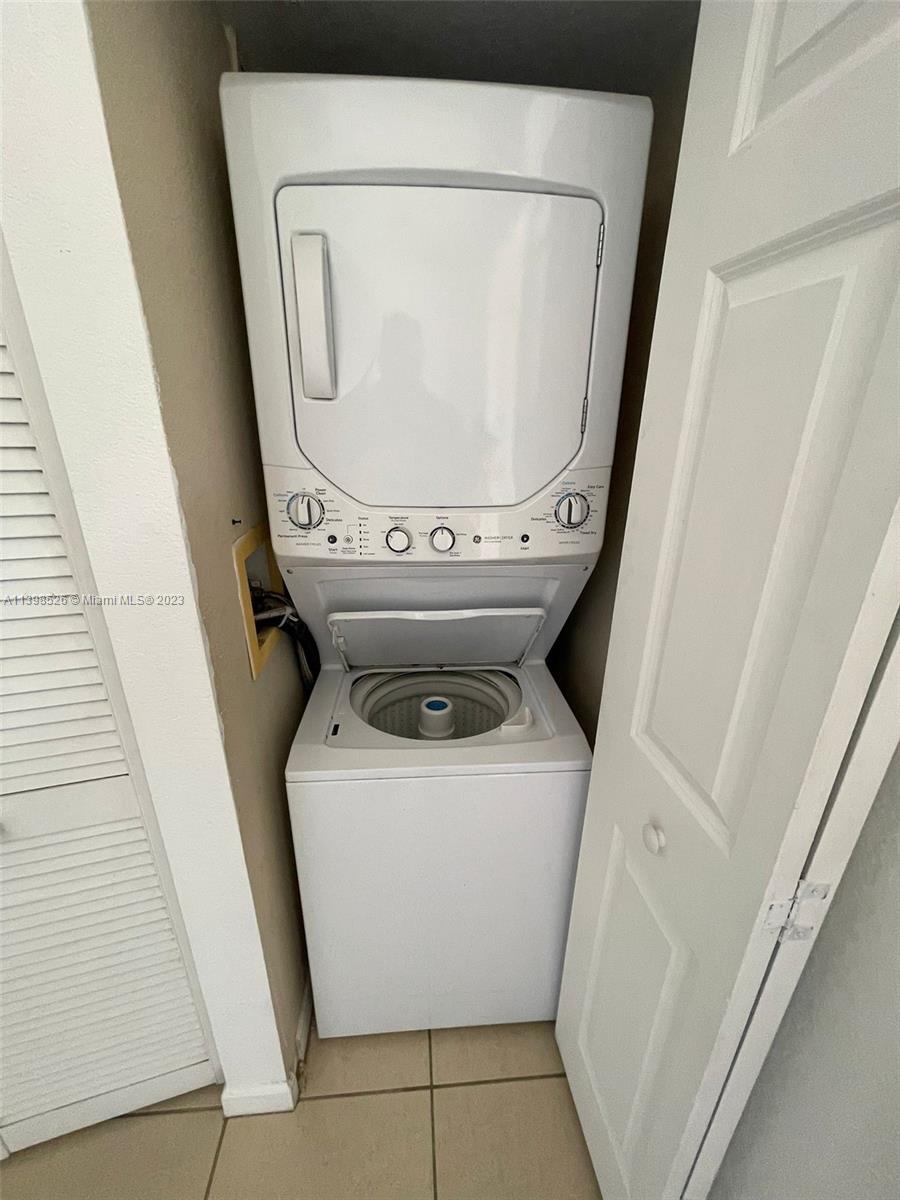 Riviera Beach Riviera Beach, FL 33404 - Photo 7 of 20 a utility room with dryer and washer