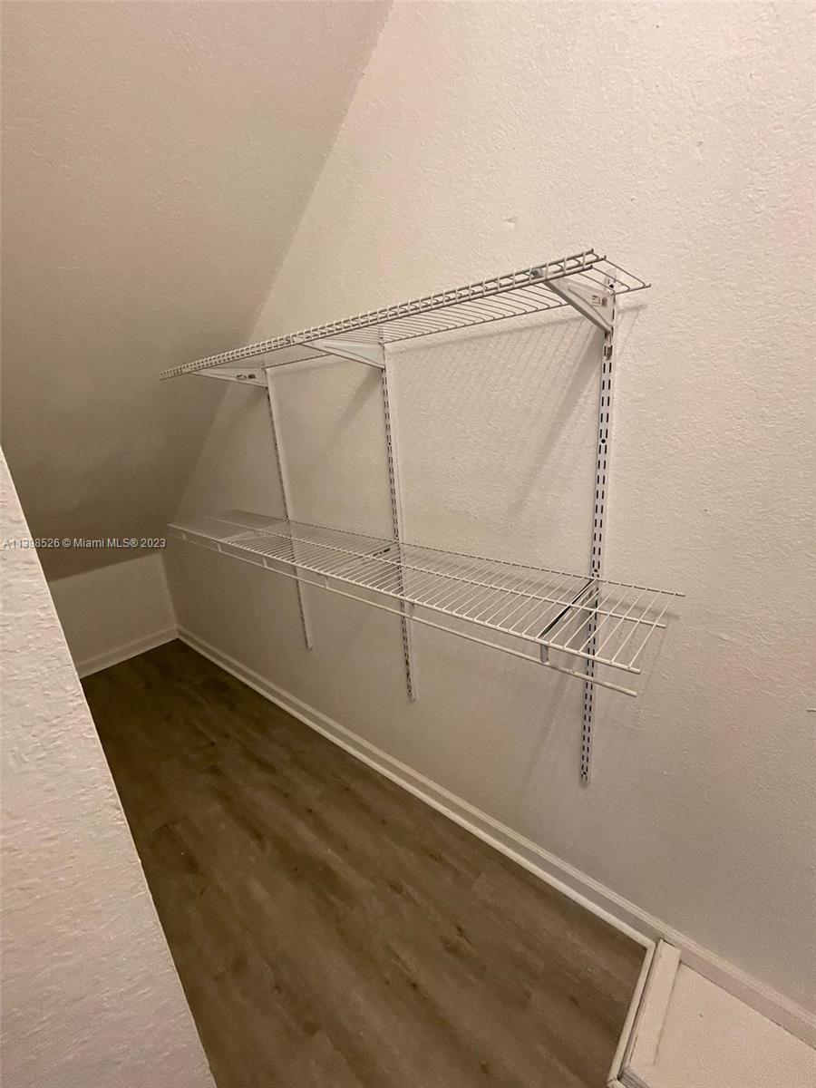 Riviera Beach Riviera Beach, FL 33404 - Photo 8 of 20 view of a room with racks on the wall