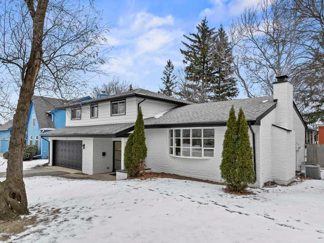 front view of a house with a trees