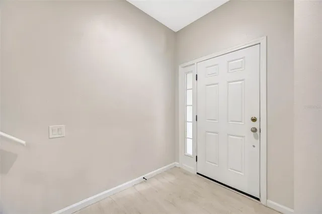 a bathroom with a double vanity sink toilet mirror and shower