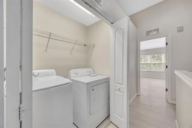 a view of a room with toys and racks on the wall