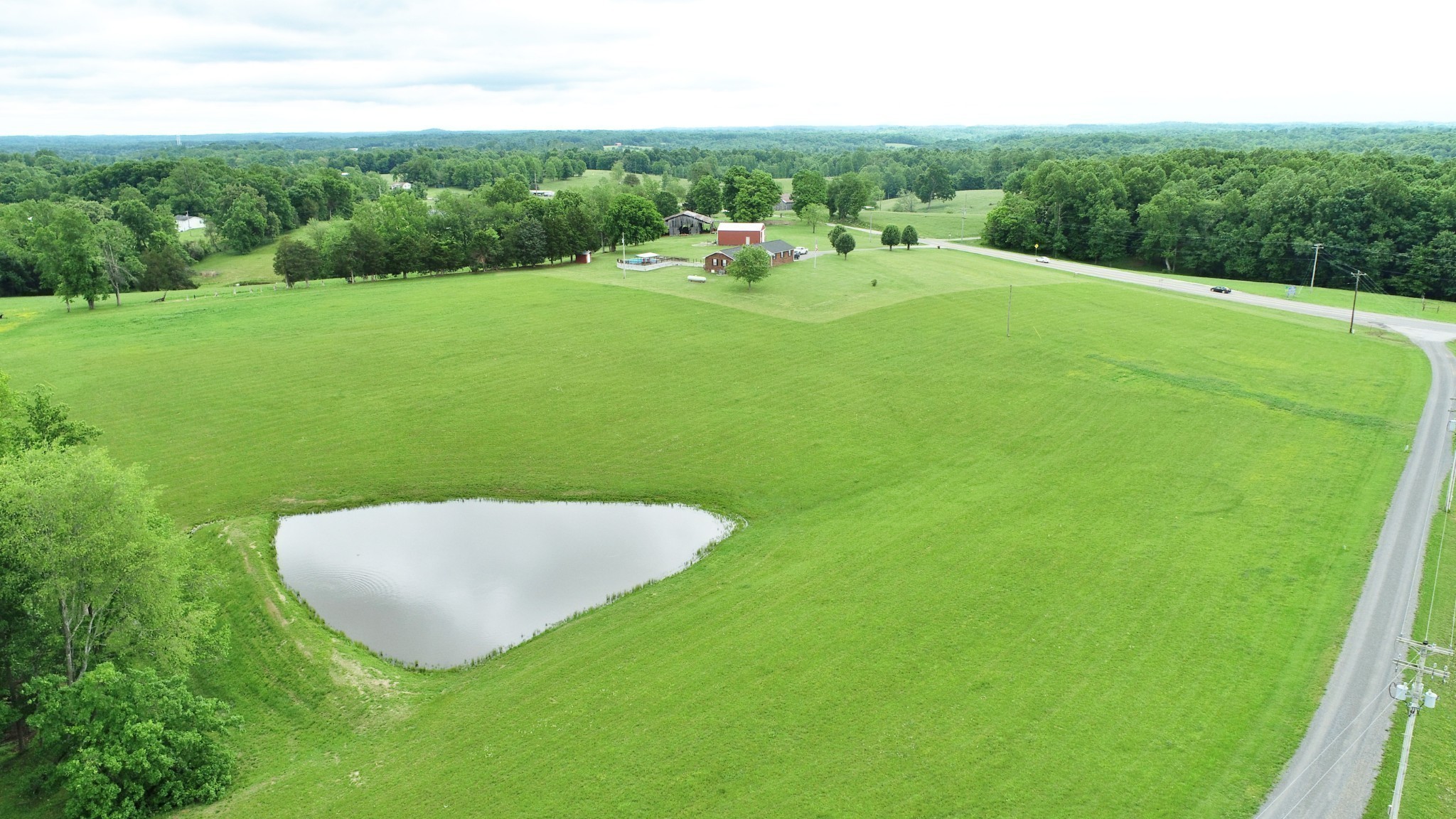9 Willie Davis Road Red Boiling Springs, TN 37150 - Photo 5 of 8 a view of a golf course with a lake