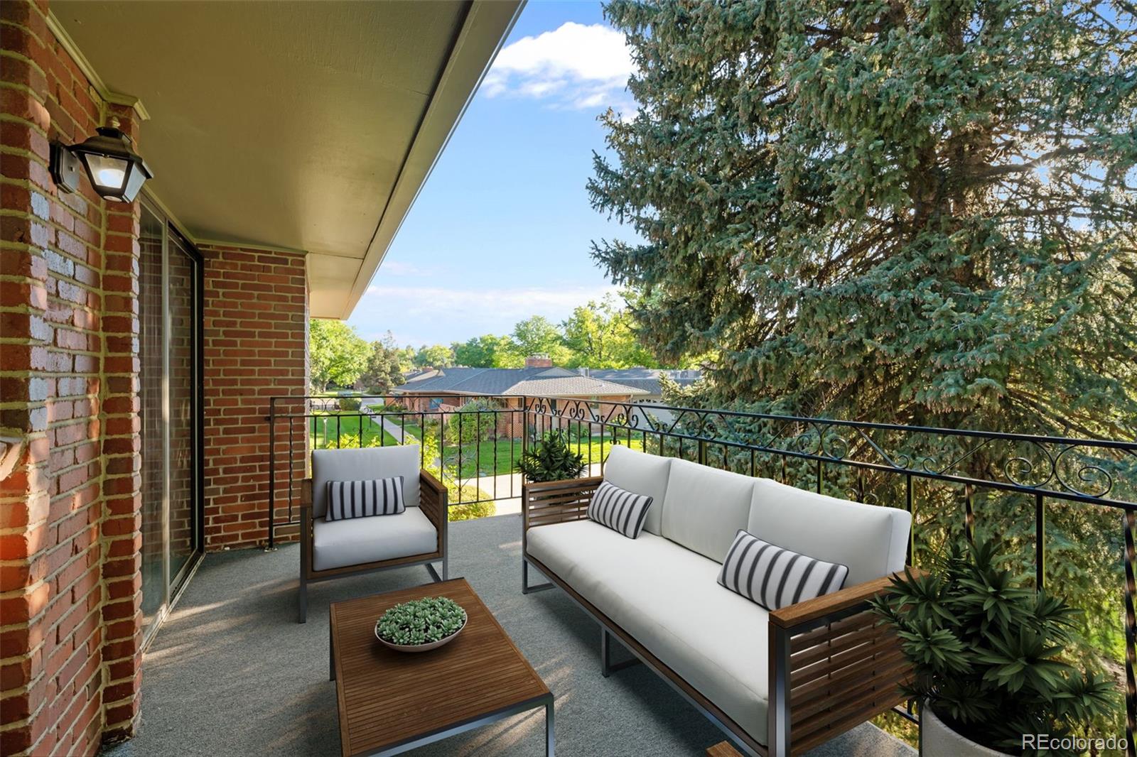 3436 South Race Street Englewood, CO 80113 - Photo 28 of 49 a balcony with furniture and a potted plant