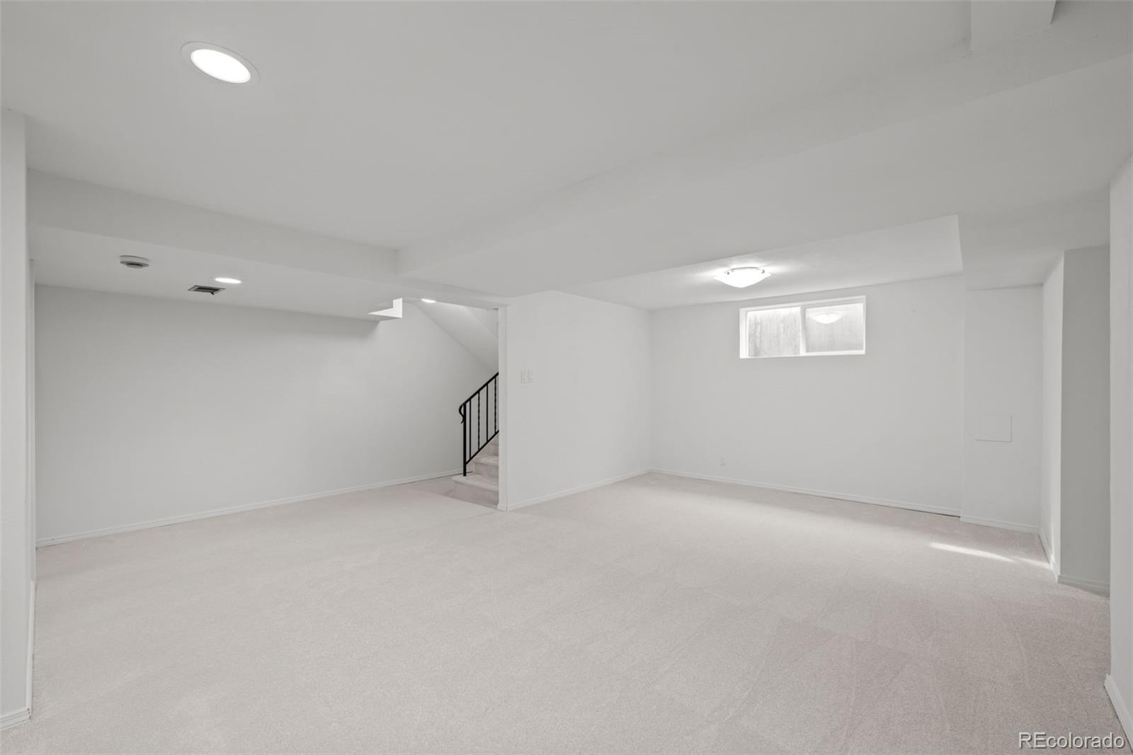 3436 South Race Street Englewood, CO 80113 - Photo 37 of 49 an empty room with a empty space and windows