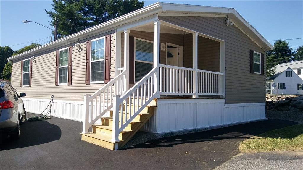 1215 N Road Groton, CT 06340 - Photo 1 of 1 a view of a house with a yard