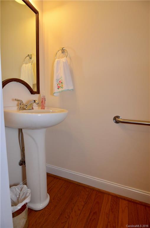 5208 Austin Road Monroe, NC 28112 - Photo 12 of 36 a bathroom with a sink and a mirror