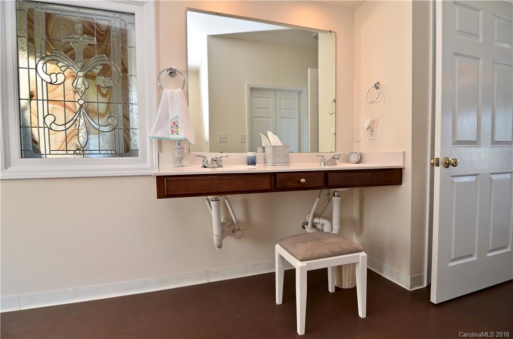 5208 Austin Road Monroe, NC 28112 - Photo 16 of 36 a room with a table chairs and a window