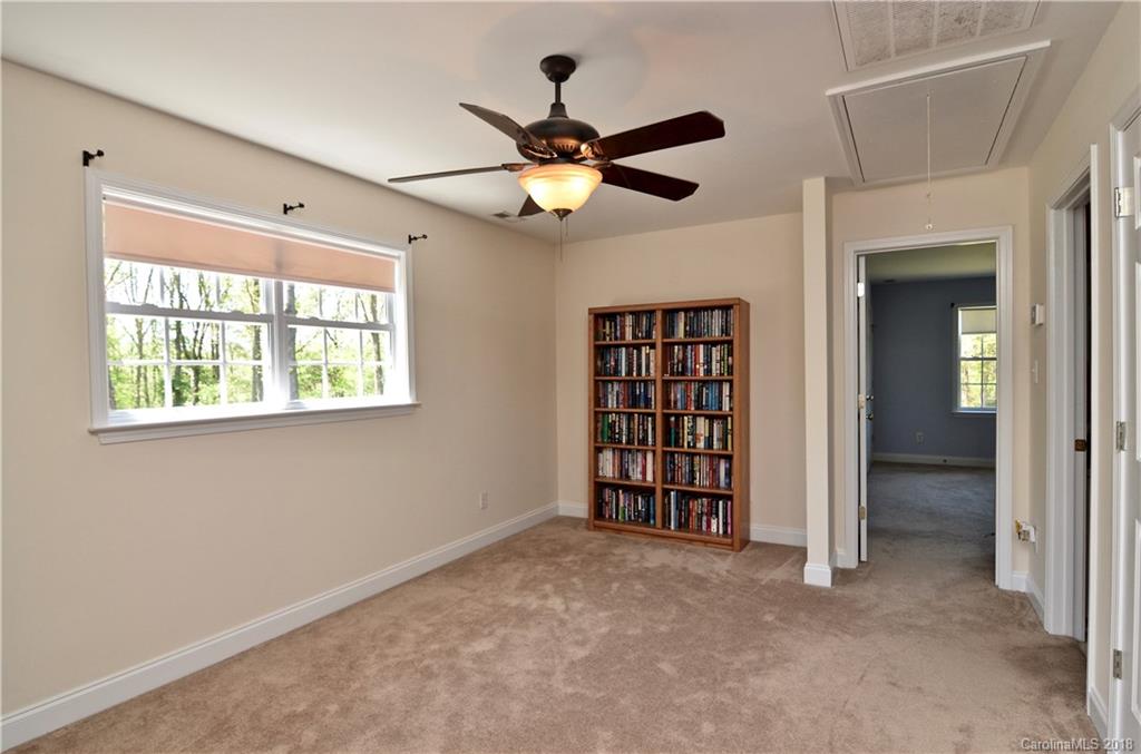 5208 Austin Road Monroe, NC 28112 - Photo 19 of 36 a view of an empty room with a window
