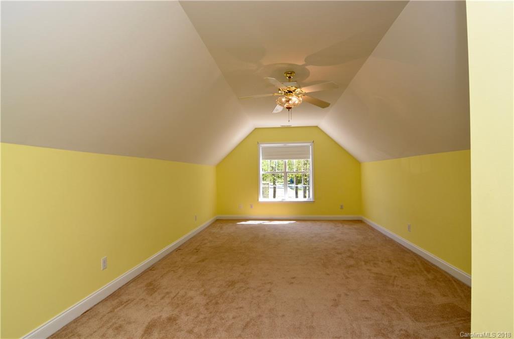 5208 Austin Road Monroe, NC 28112 - Photo 23 of 36 an empty room with a window
