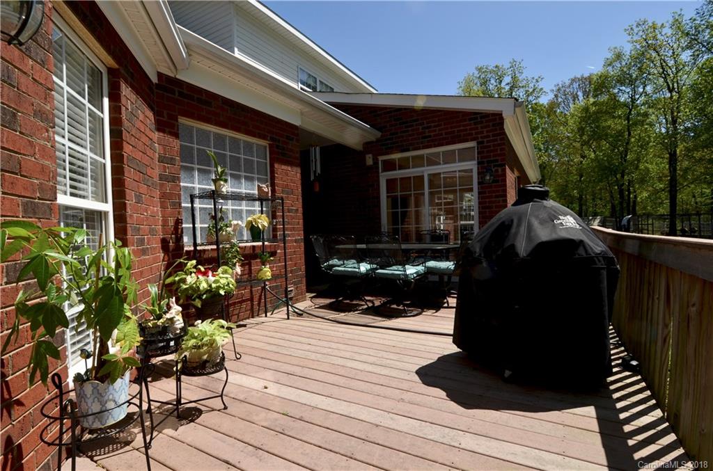 5208 Austin Road Monroe, NC 28112 - Photo 24 of 36 a view of a house with a patio