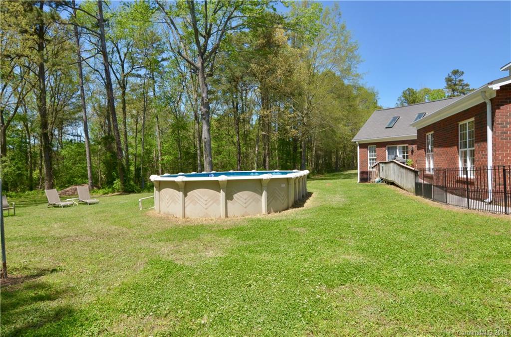 5208 Austin Road Monroe, NC 28112 - Photo 27 of 36 a house view with a garden space