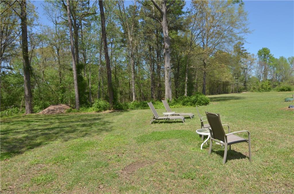 5208 Austin Road Monroe, NC 28112 - Photo 28 of 36 a view of a park with a slide