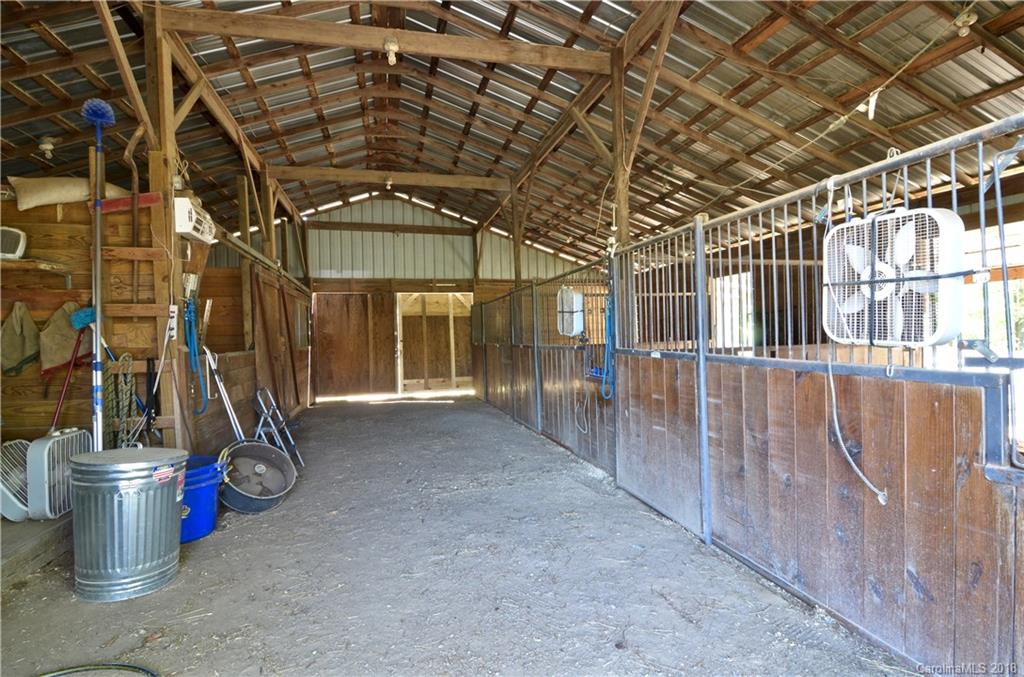 5208 Austin Road Monroe, NC 28112 - Photo 32 of 36 a view of a room with wooden floor and windows