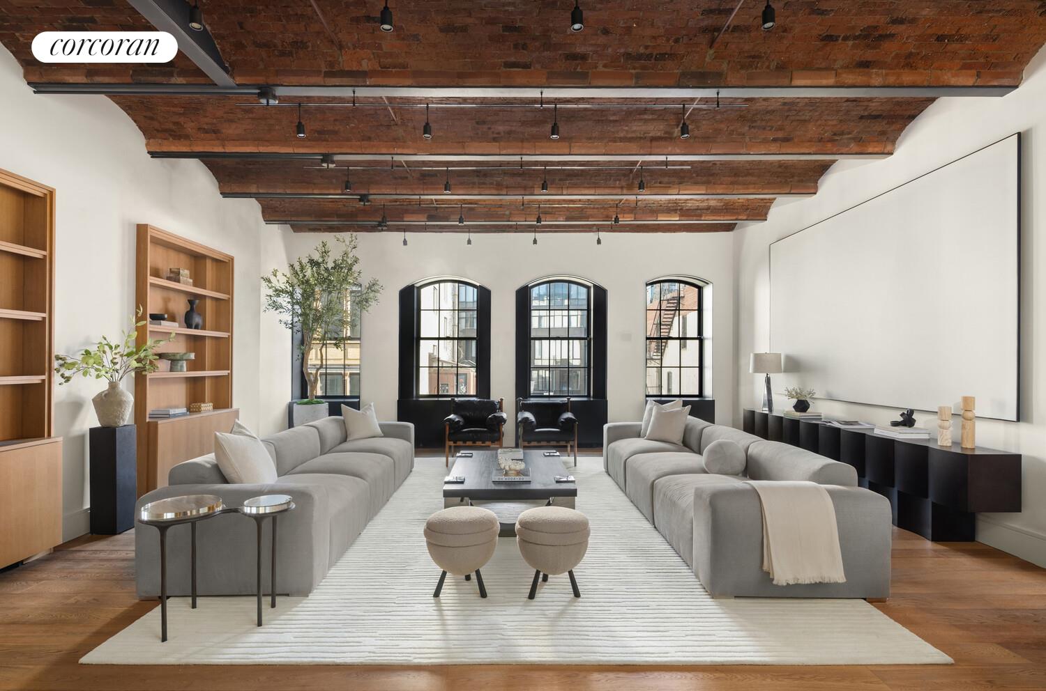 36 Bleecker Street, Unit 5A Manhattan, NY 10012 - Photo 1 of 39 a living room with furniture