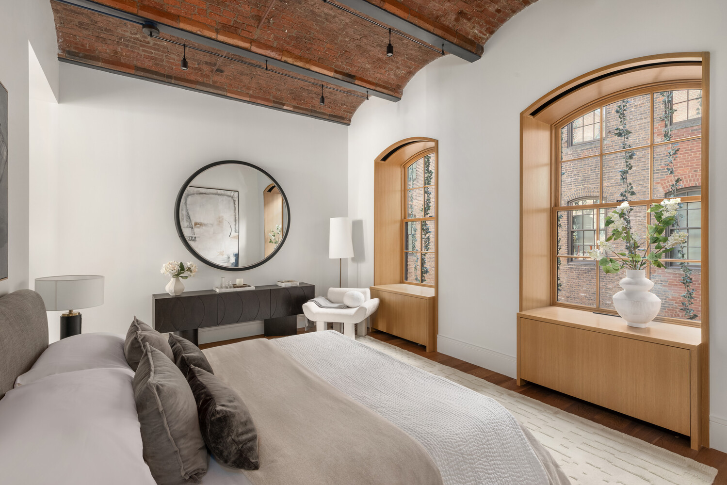 36 Bleecker Street, Unit 5A Manhattan, NY 10012 - Photo 25 of 39 a bedroom with bed and a large window