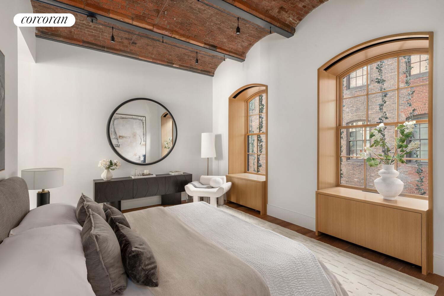 36 Bleecker Street, Unit 5A Manhattan, NY 10012 - Photo 6 of 39 a bedroom with bed and a large window