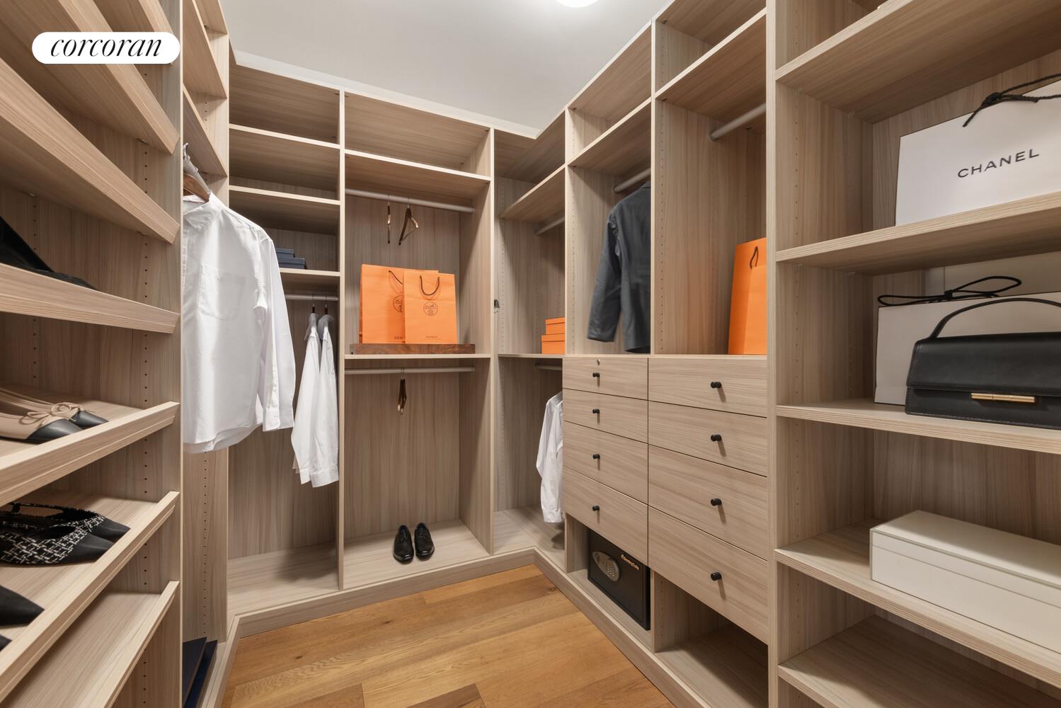 36 Bleecker Street, Unit 5A Manhattan, NY 10012 - Photo 9 of 39 a view of walk in closet with clothes and shoes